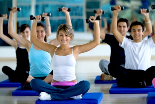 Gym group exercising