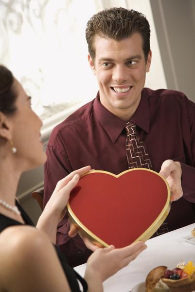 Man giving woman Valentine.