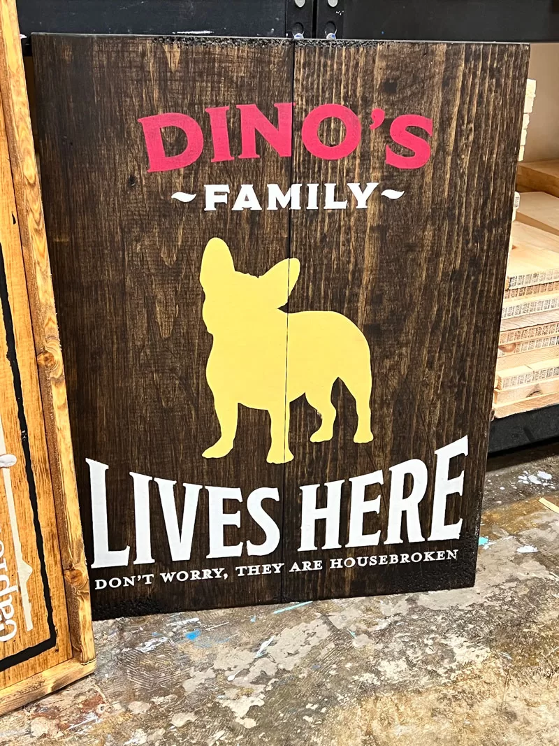 Personalized wooden sign with a French Bulldog silhouette and Dino’s family message.