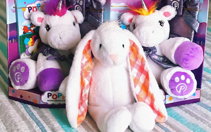 Plushible Cuddibles bunny and unicorn plush toys displayed together as cute plush gift ideas for kids and babies.