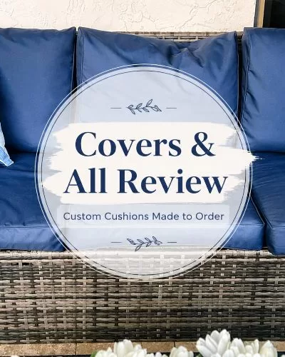Navy outdoor patio couch cushions with striped pillows and a centered Covers & All Review overlay.