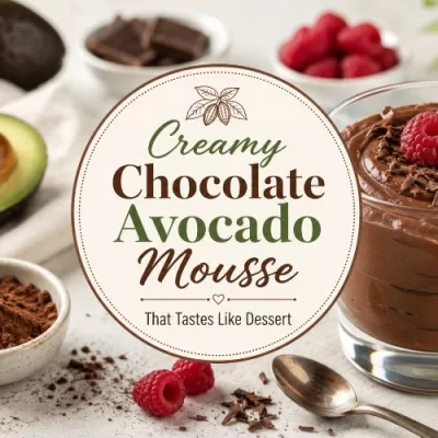 Featured image for creamy chocolate avocado mousse showing a chocolate mousse dessert with raspberries, avocado, cocoa powder, and a centered title graphic.