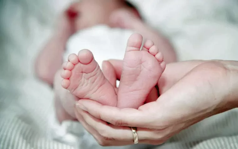 Newborn baby feet