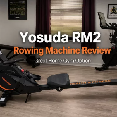 Yosuda RM2 rowing machine review featured image showing a compact rowing machine in a home gym workout room with fitness equipment and motivational wall decor.