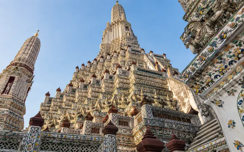 Wat Arun’s porcelain-covered towers beside the Chao Phraya River